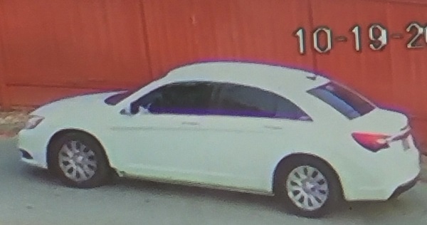 Photo of suspect vehicle - white four door sedan