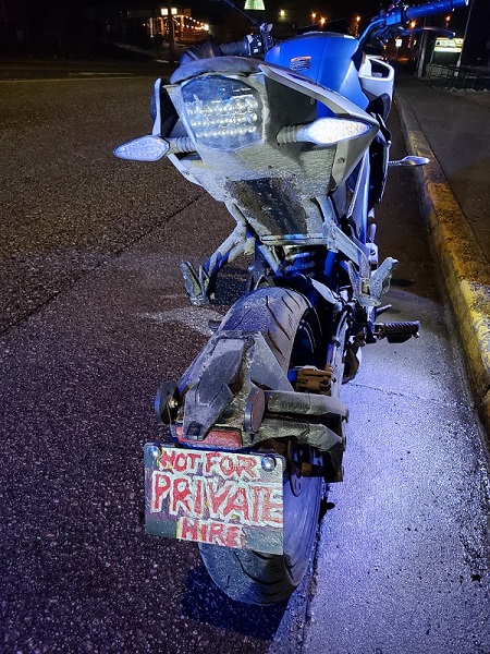 Motorcycle with fake hand written license plate